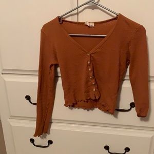 Orange long sleeve button down crop top